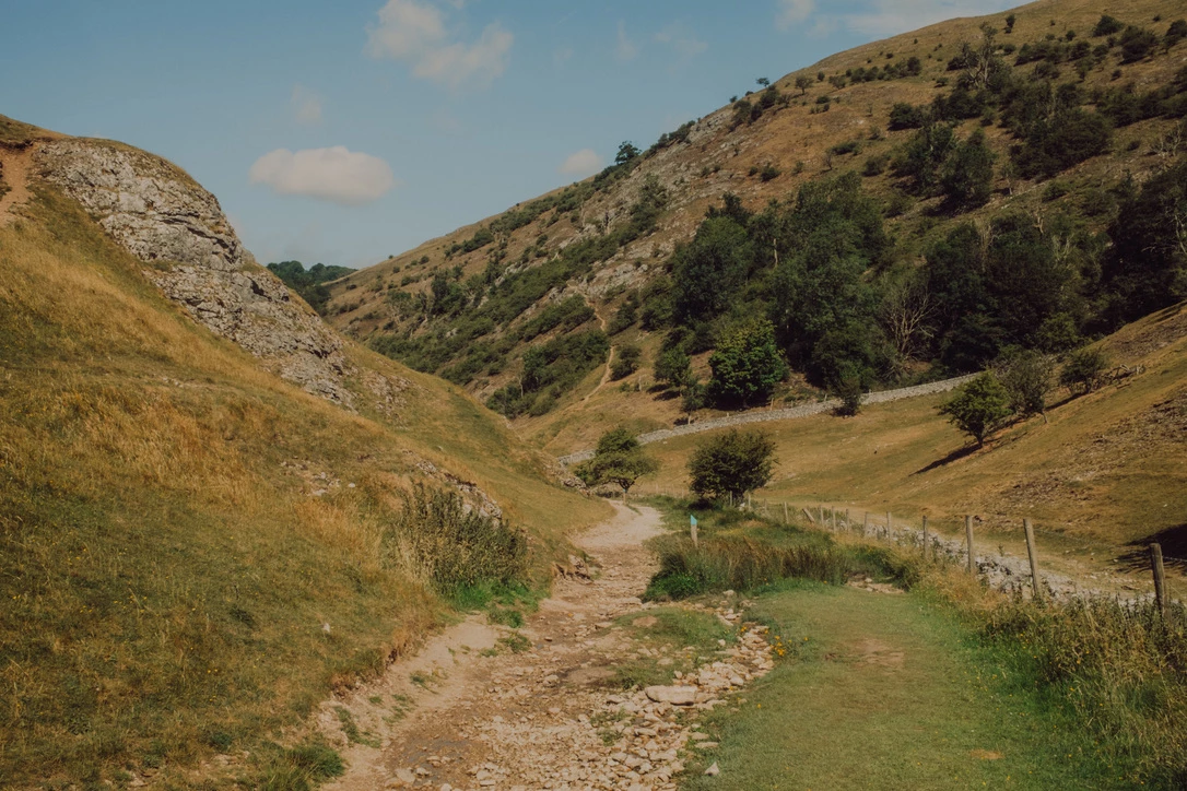 A stoney path through hills. Photograph by Dave Smyth.
