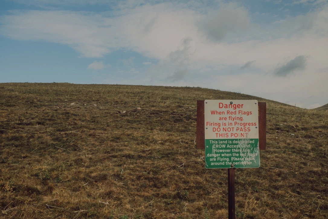 Danger sign near a clay pigeon shooting area. Photograph by Dave Smyth.